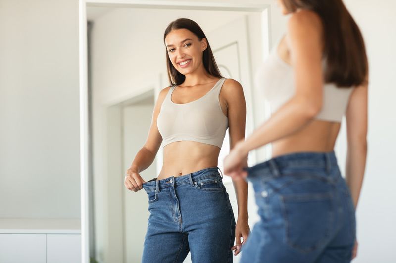 Loose-fitting jeans after weight loss